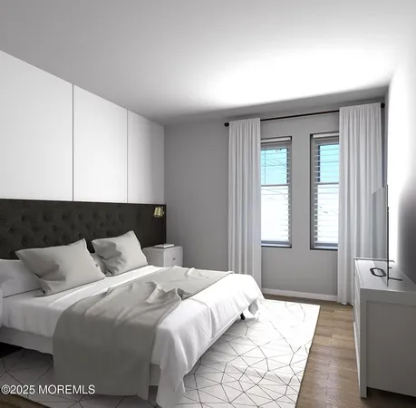 a bedroom with bed and window