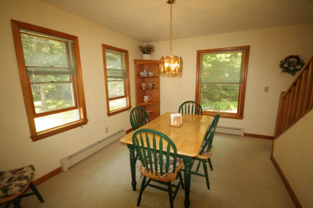14 Schooner Ridge Road East Boothbay, ME 04544 - Photo 12 of 29 The dining room, with wall to wall...