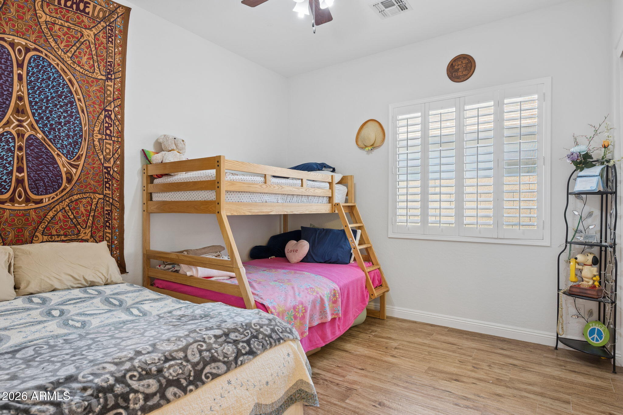 5508 West Parsons Road Phoenix, AZ 85083 - Photo 26 of 48 a bedroom with a bed and a window