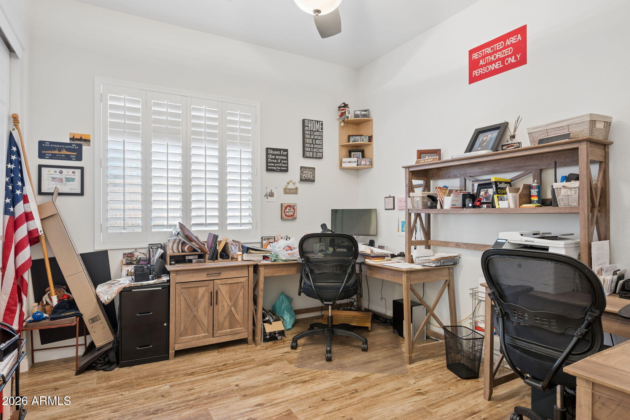 5508 West Parsons Road Phoenix, AZ 85083 - Photo 30 of 48 a view of a workspace with furniture and a window