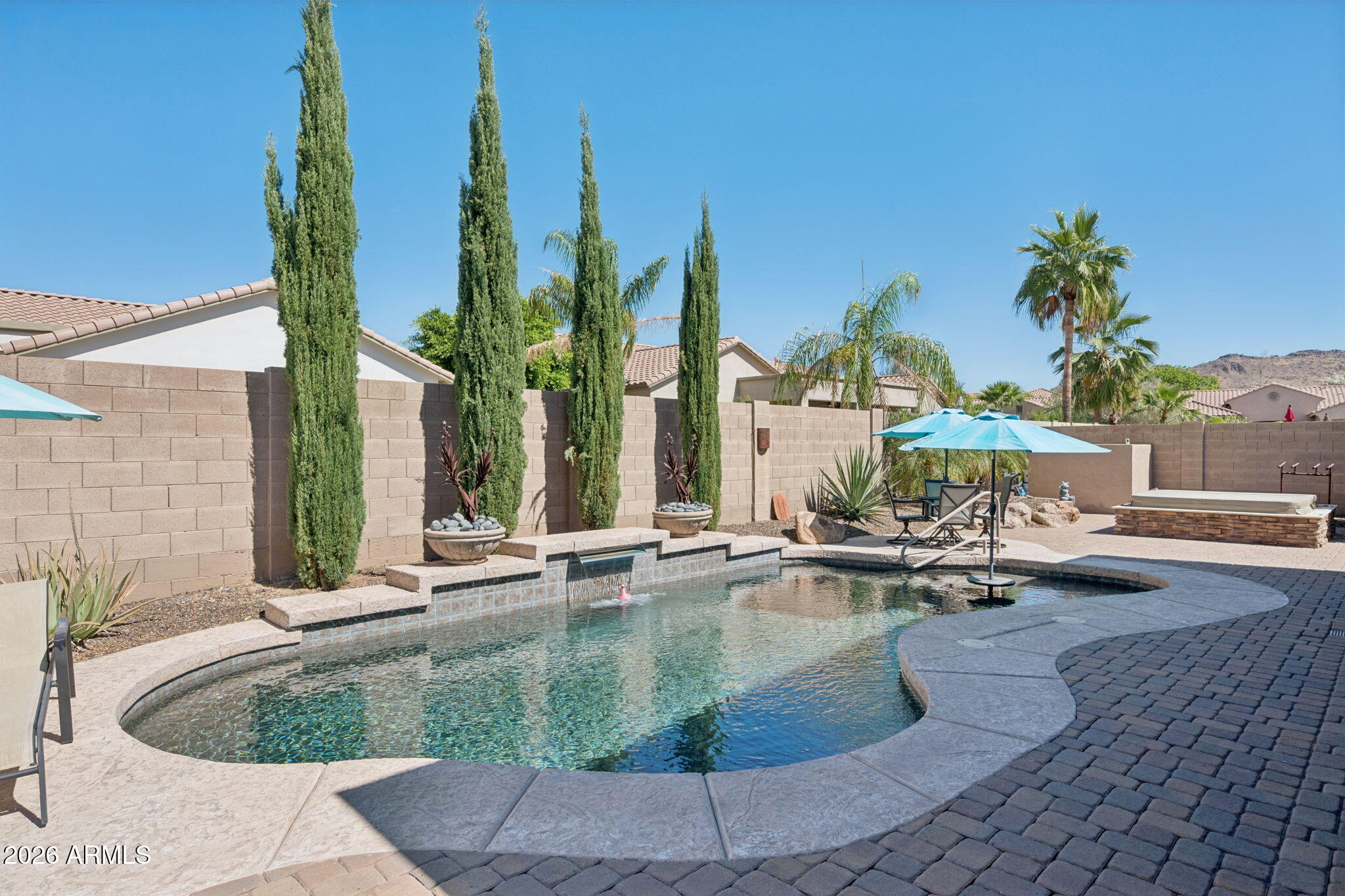 5508 West Parsons Road Phoenix, AZ 85083 - Photo 41 of 48 a view of a swimming pool with sitting area