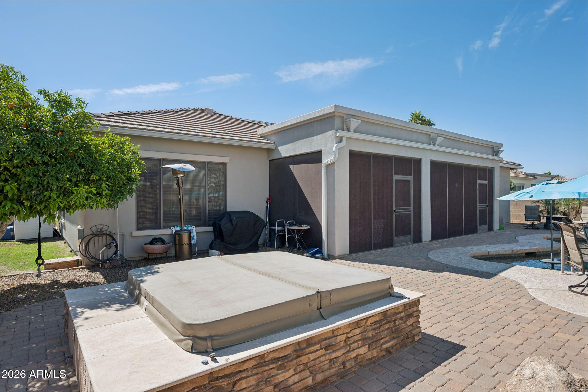 5508 West Parsons Road Phoenix, AZ 85083 - Photo 43 of 48 a view of a dinning table and chairs in patio of the house