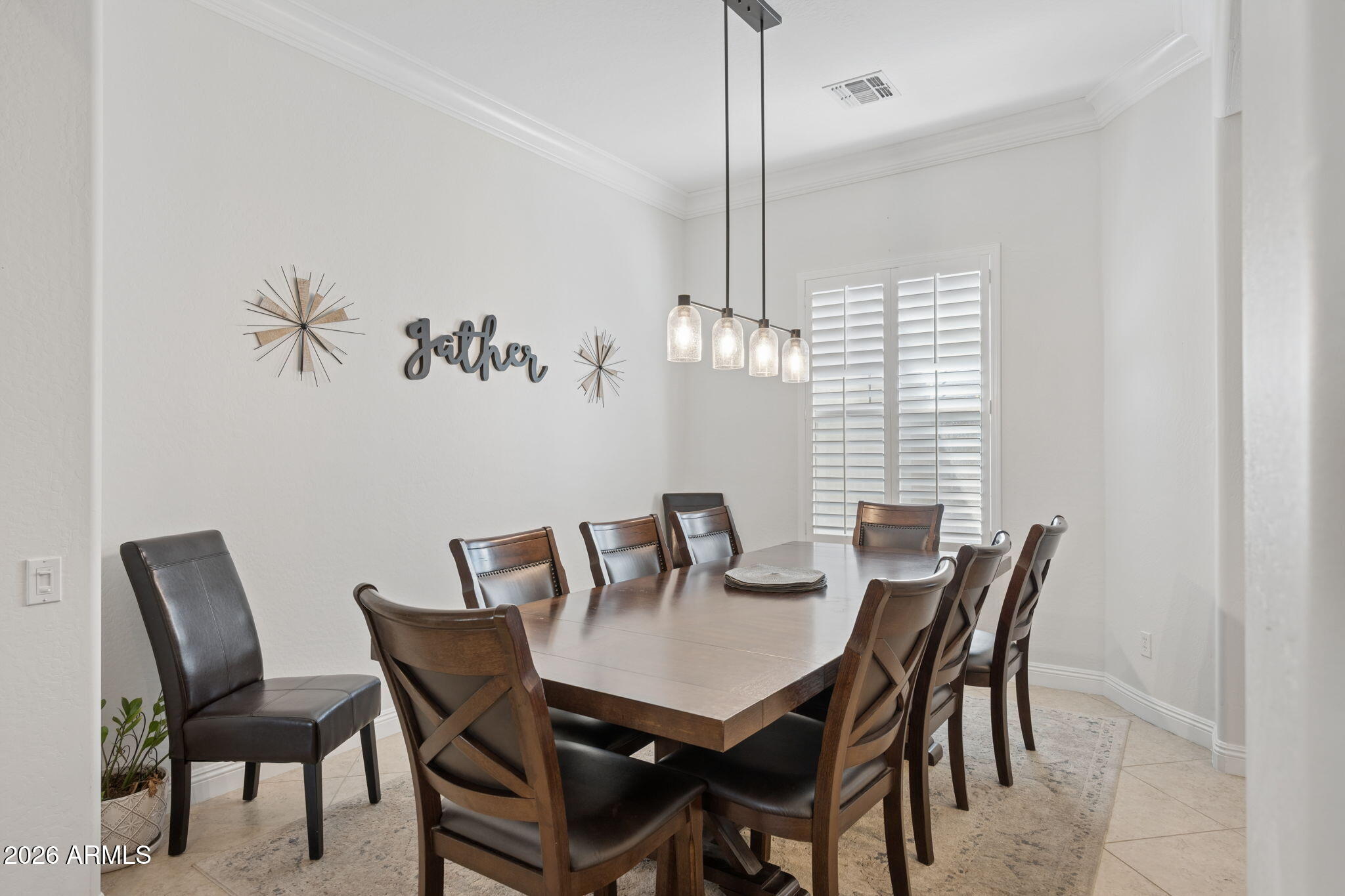 5508 West Parsons Road Phoenix, AZ 85083 - Photo 6 of 48 a view of a dining room with furniture window and wooden floor