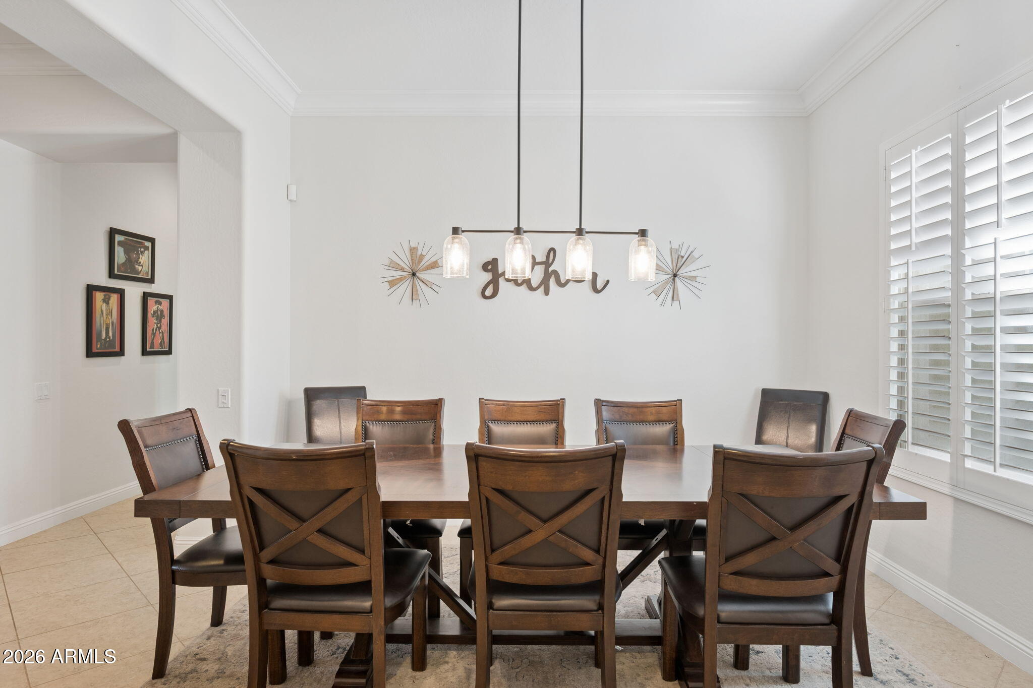 5508 West Parsons Road Phoenix, AZ 85083 - Photo 7 of 48 a view of a dining room with furniture and chandelier