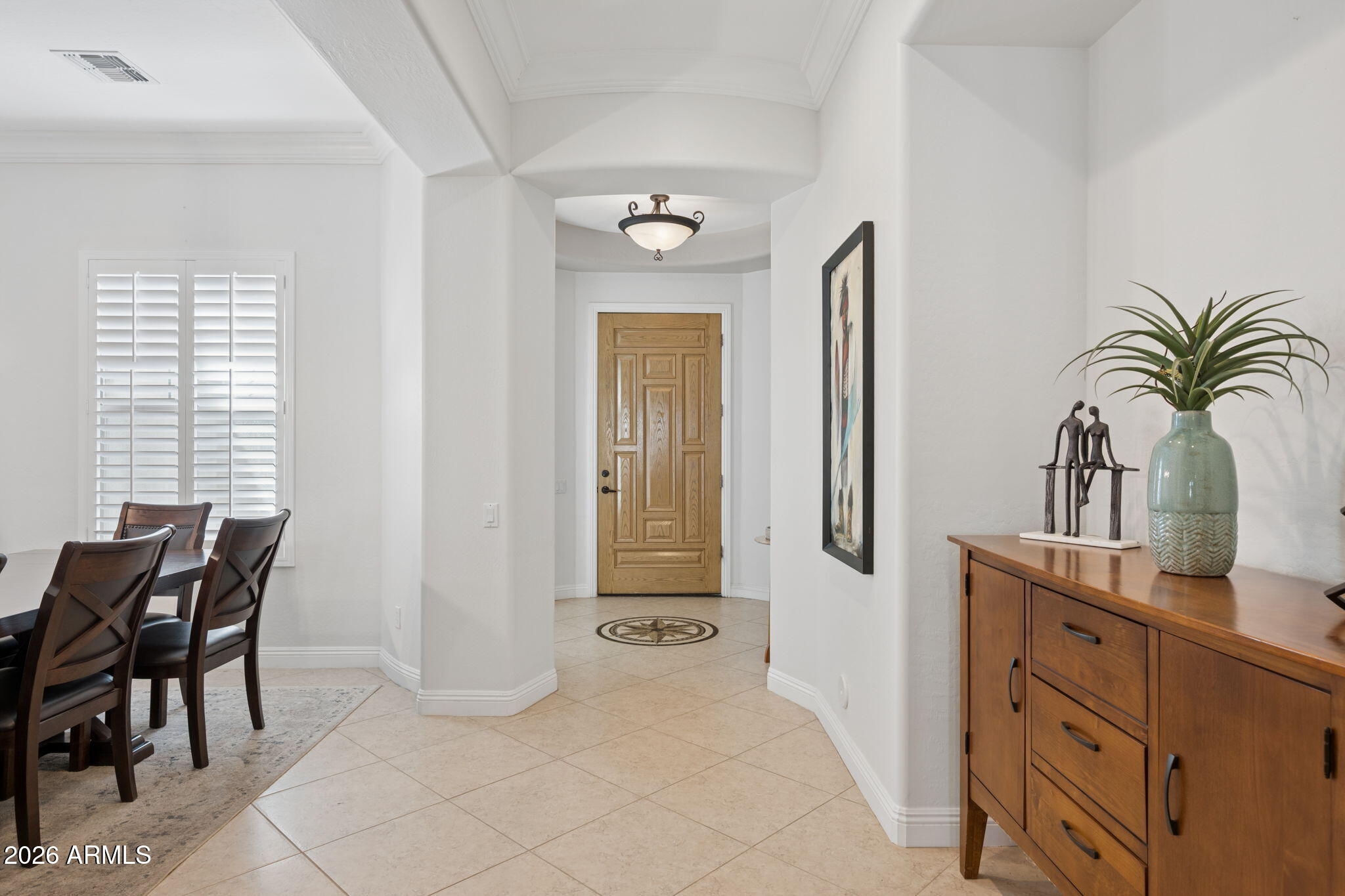 5508 West Parsons Road Phoenix, AZ 85083 - Photo 8 of 48 a view of a hallway with furniture and a window