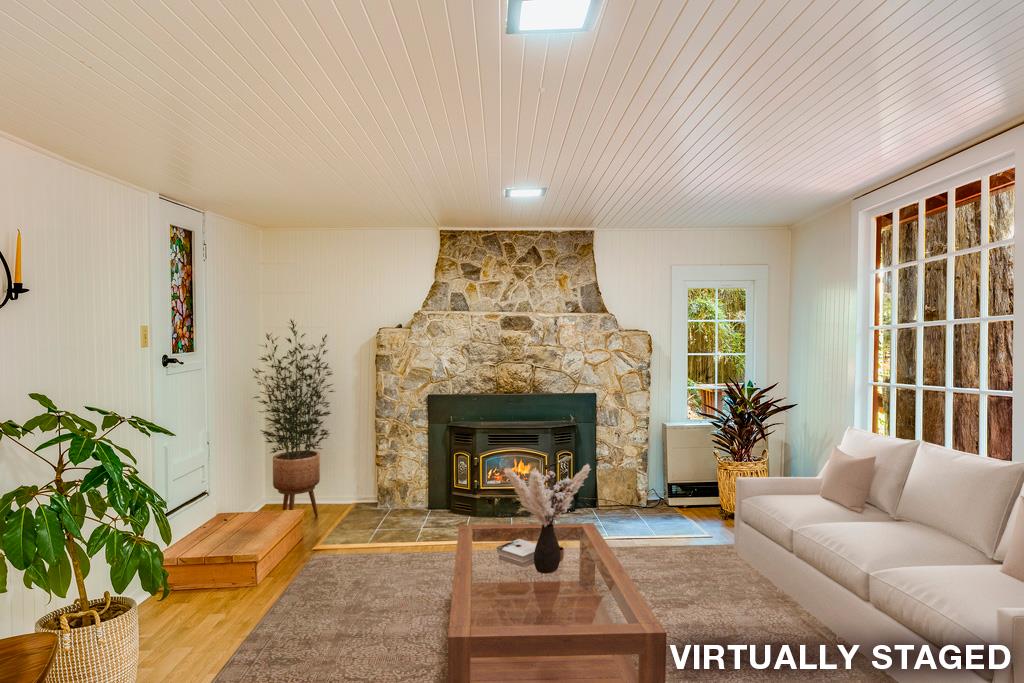 2001 Cathedral Drive Aptos, CA 95003 - Photo 16 of 42 a living room with furniture and a fireplace