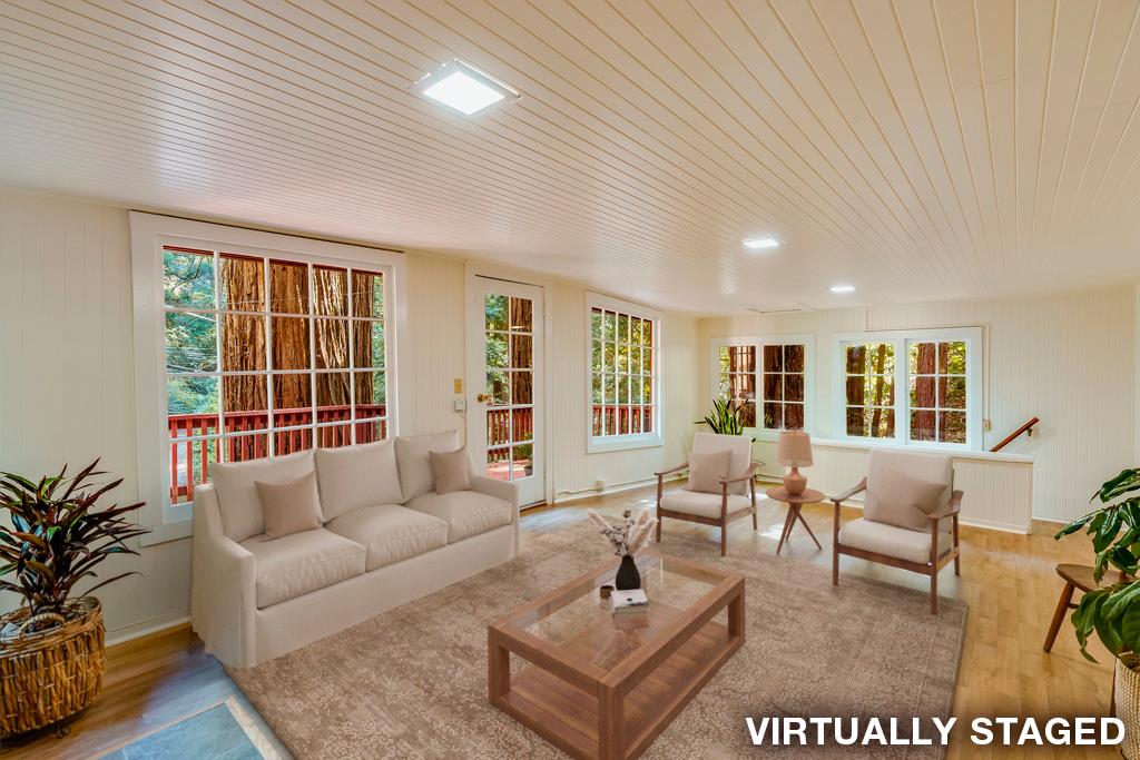 2001 Cathedral Drive Aptos, CA 95003 - Photo 17 of 42 a living room with furniture and floor to ceiling windows