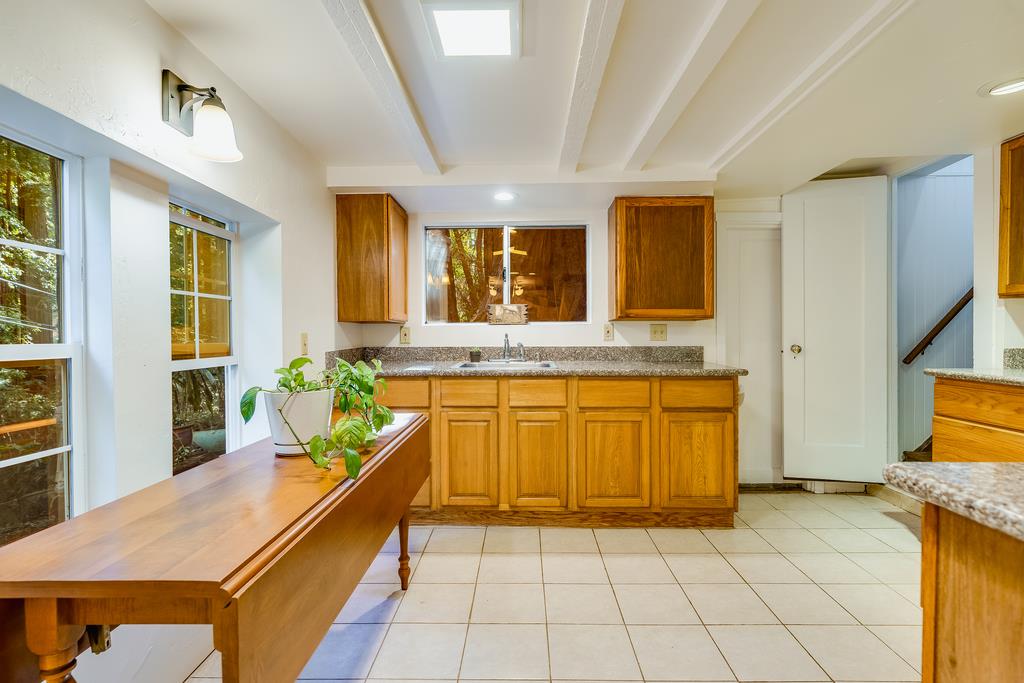 2001 Cathedral Drive Aptos, CA 95003 - Photo 8 of 42 a bathroom with a granite countertop sink and a bathtub