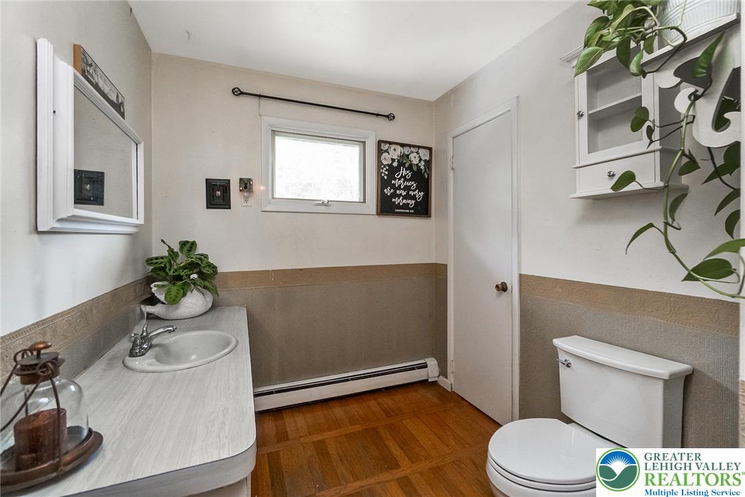 135 Haney Road Kunkletown, PA 18058 - Photo 28 of 53 a bathroom with a toilet a sink and mirror