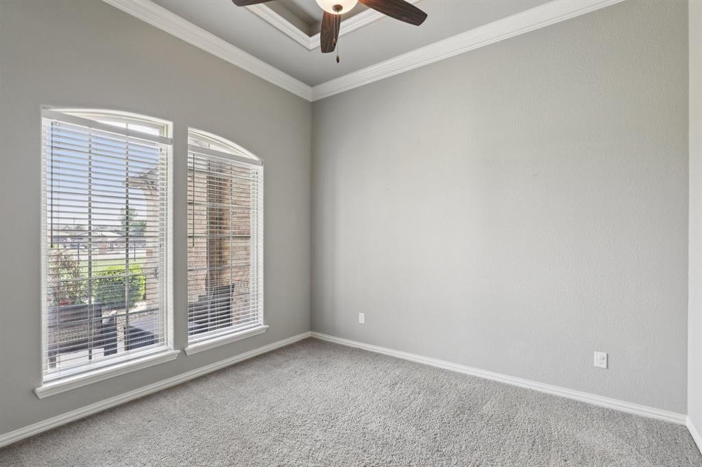 1020 Jesse James Lane Springtown, TX 76082 - Photo 13 of 38 an empty room with windows
