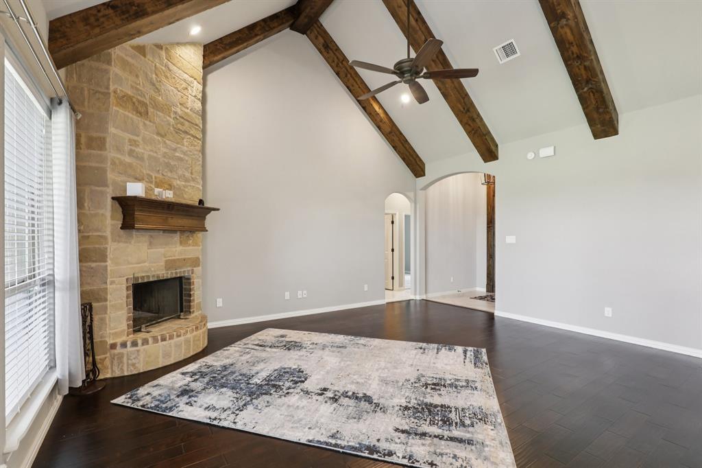 1020 Jesse James Lane Springtown, TX 76082 - Photo 9 of 38 a view of a living room with a fireplace