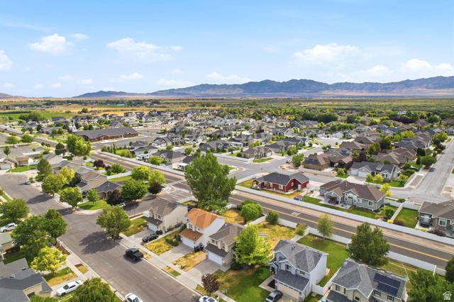 5485 Heather Way Tooele, UT 84074 - Photo 40 of 41 Residential neighborhood featuring a variety of single-family homes, paved streets, and established landscaping
