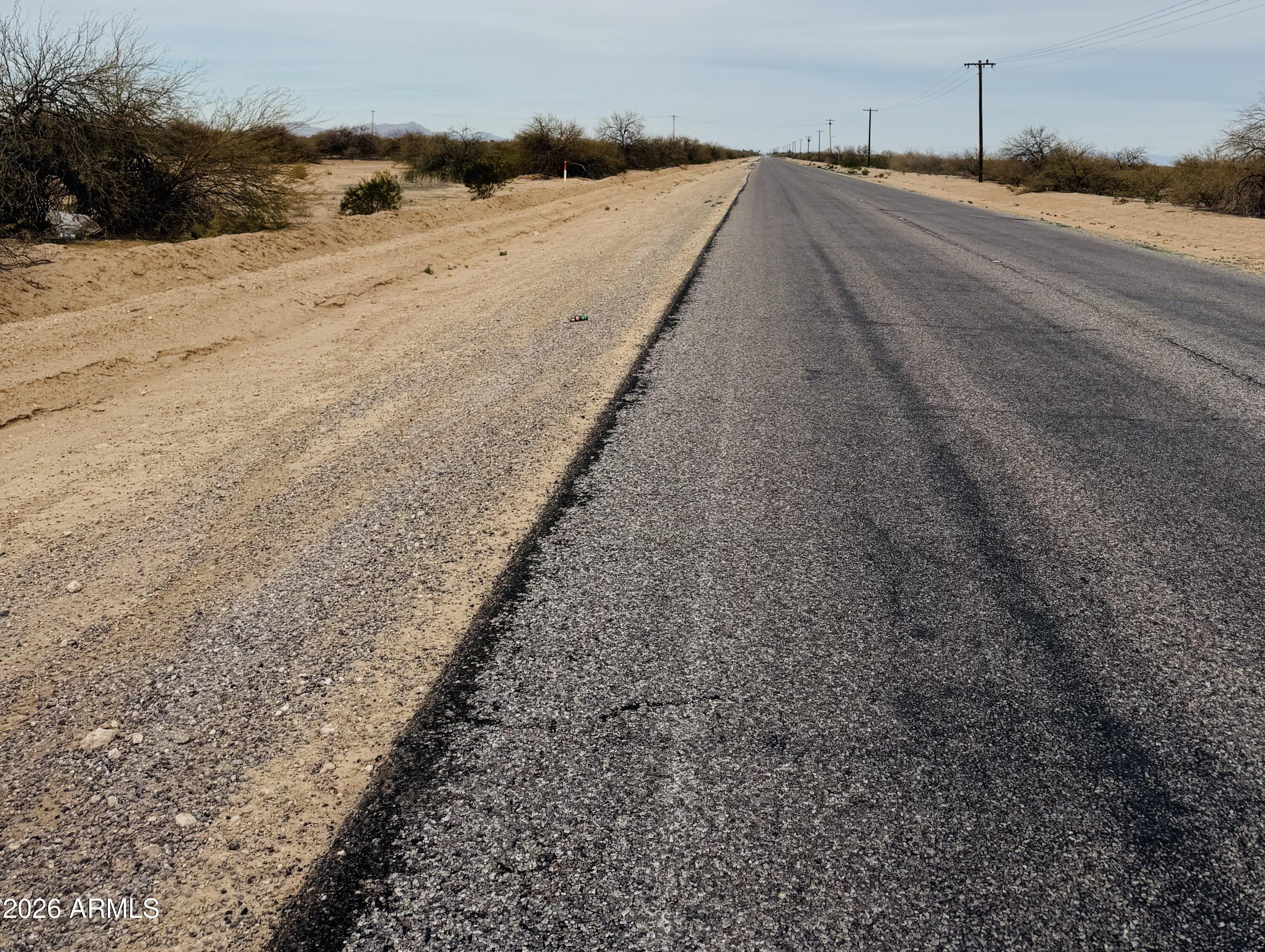 4805 North Estrella Road, Unit 3 Eloy, AZ 85131 - Photo 2 of 3 a view of a road with an ocean view