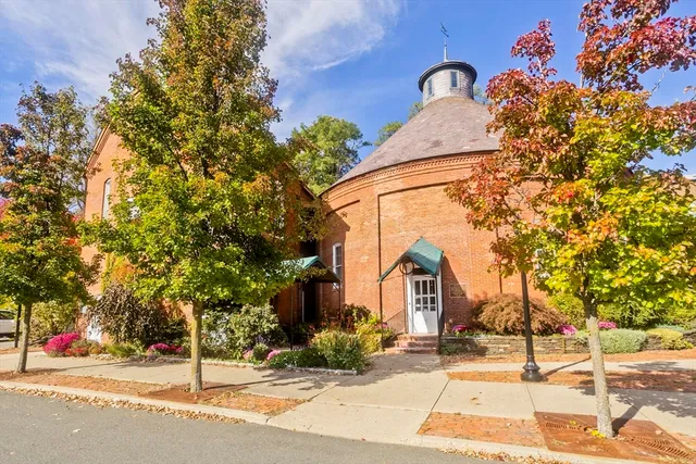 a view of a building with a street