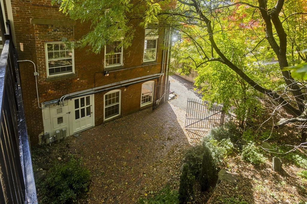 244 Main Street Northampton, MA 01060 - Photo 25 of 28 a view of a house with a yard
