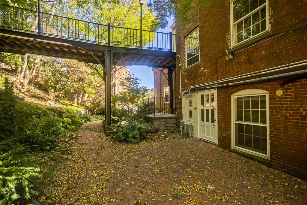 244 Main Street Northampton, MA 01060 - Photo 27 of 28 a view of a pathway of a building