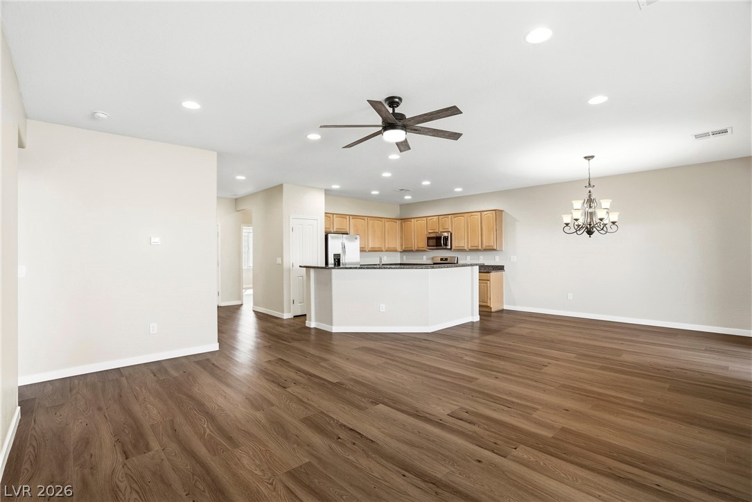 2541 Darda Street Henderson, NV 89044 - Photo 4 of 26 This inviting space combines kitchen convenience with living area comfort.