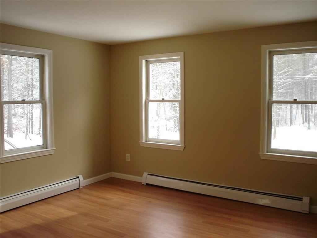 73 Lone Pine Road North Waterboro, ME 04061 - Photo 7 of 17 Living room with lots of windows and...