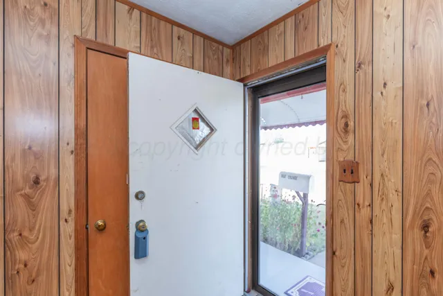 a bathroom with a double vanity sink a mirror and a shower
