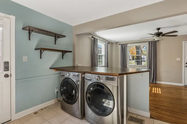 a view of livingroom with washer and dryer