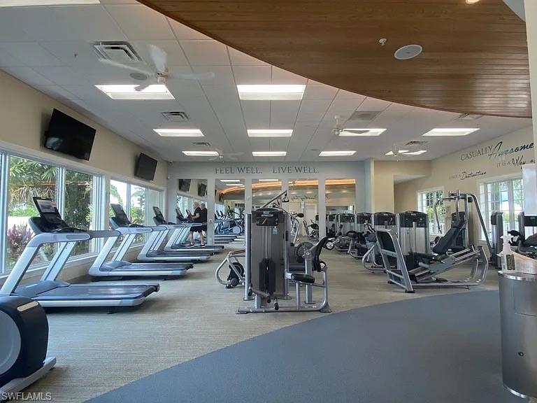 14672 Edgewater Circle Naples, FL 34114 - Photo 37 of 41 a view of a room with gym equipment