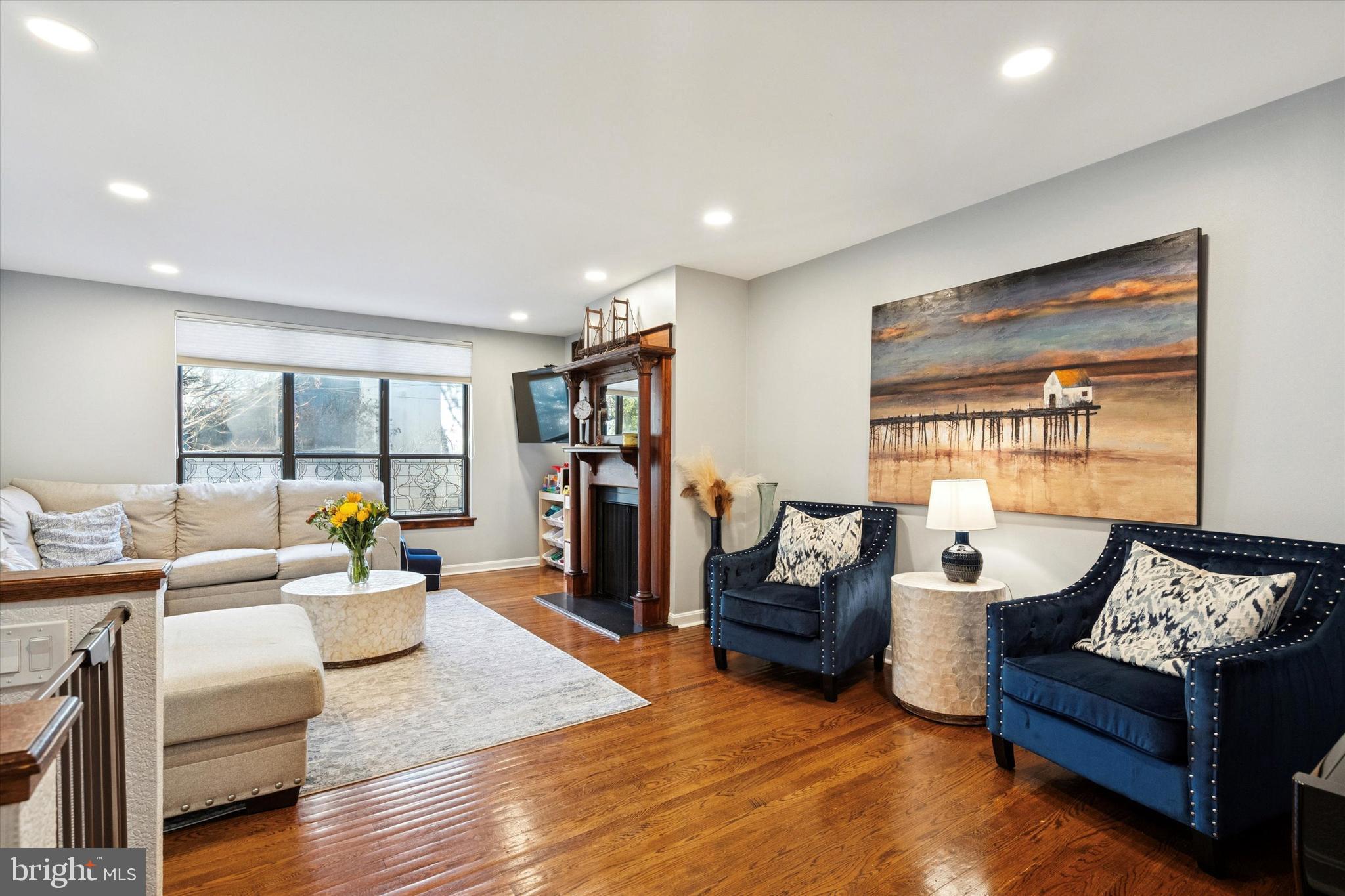 315 Fitzwater Street Philadelphia, PA 19147 - Photo 13 of 32 a living room with furniture and a wooden floor