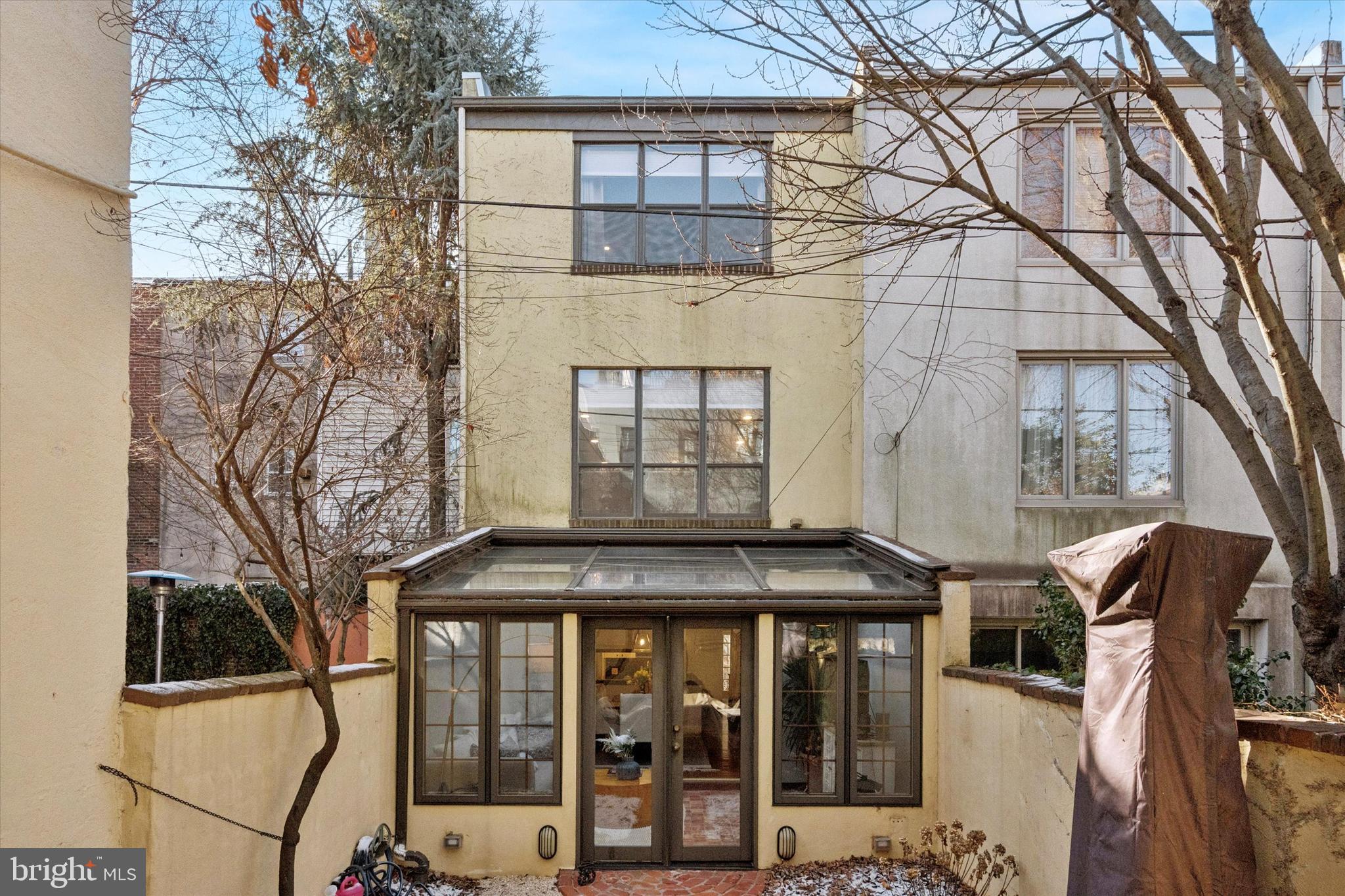 315 Fitzwater Street Philadelphia, PA 19147 - Photo 28 of 32 a front view of a building with glass windows and door