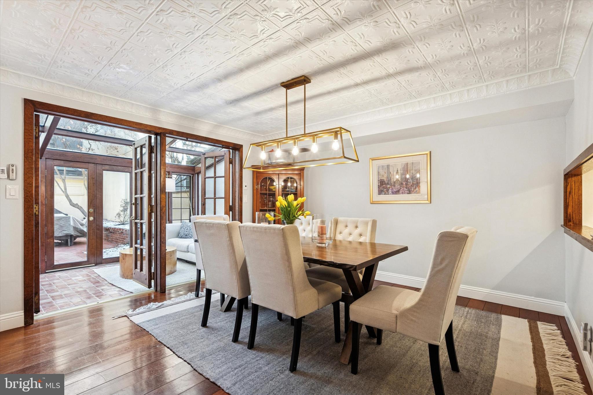 315 Fitzwater Street Philadelphia, PA 19147 - Photo 9 of 32 a view of a dining room with furniture wooden floor and chandelier