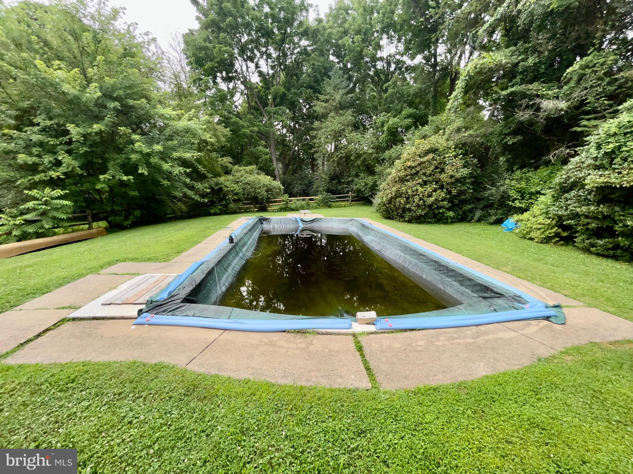33 Waterview Road West Chester, PA 19380 - Photo 9 of 28 Gunite pool painted white with turquoise border