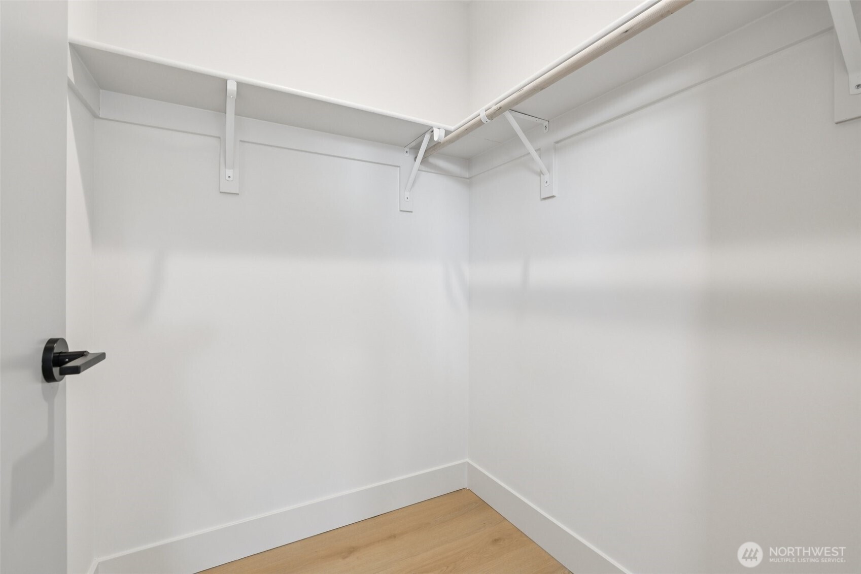 2628 58th Avenue Southwest Seattle, WA 98116 - Photo 18 of 38 a view of a room with racks on the wall