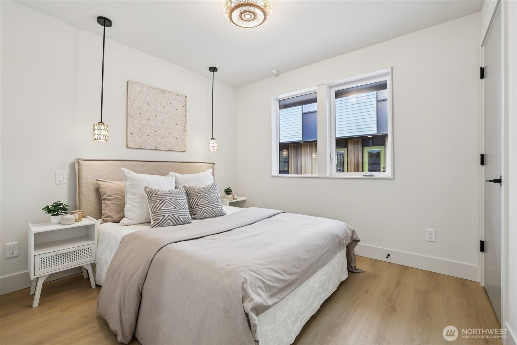 2628 58th Avenue Southwest Seattle, WA 98116 - Photo 23 of 38 a bedroom with a bed and a window