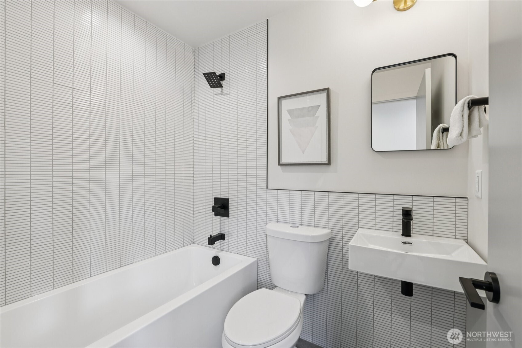 2628 58th Avenue Southwest Seattle, WA 98116 - Photo 25 of 38 a bathroom with a toilet sink and bathtub