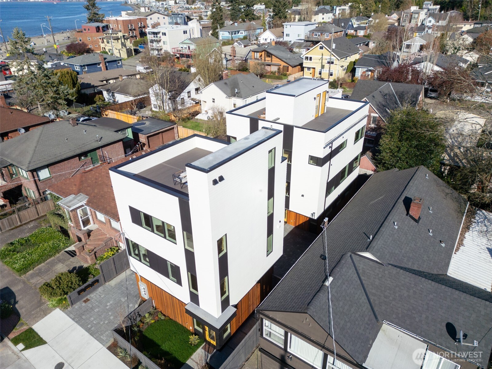 2628 58th Avenue Southwest Seattle, WA 98116 - Photo 28 of 38 an aerial view of residential houses with city view