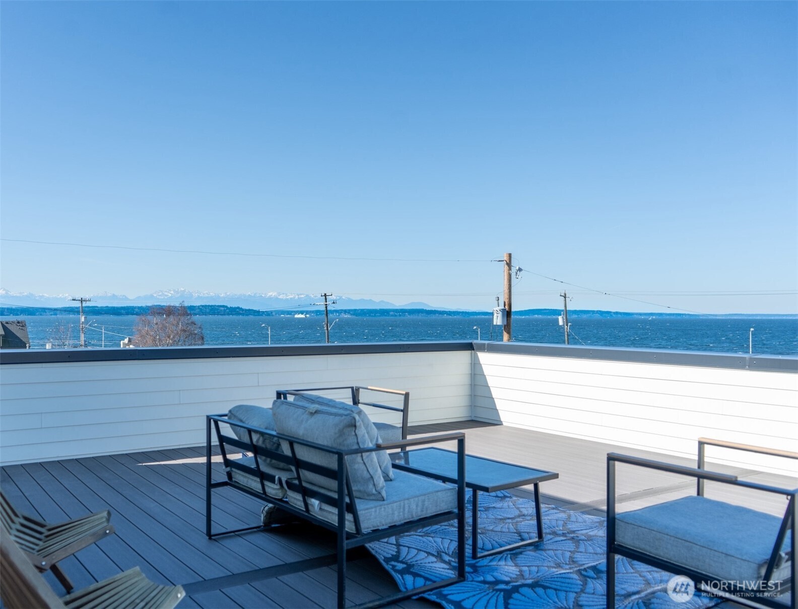 2628 58th Avenue Southwest Seattle, WA 98116 - Photo 35 of 38 a view of sitting area with furniture and wooden floor