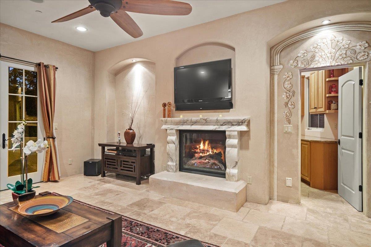 2970 Congress Road Pebble Beach, CA 93953 - Photo 18 of 37 a living room with furniture and a fireplace