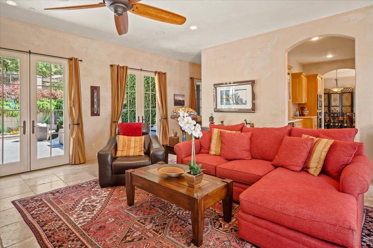 2970 Congress Road Pebble Beach, CA 93953 - Photo 19 of 37 a living room with furniture and a rug