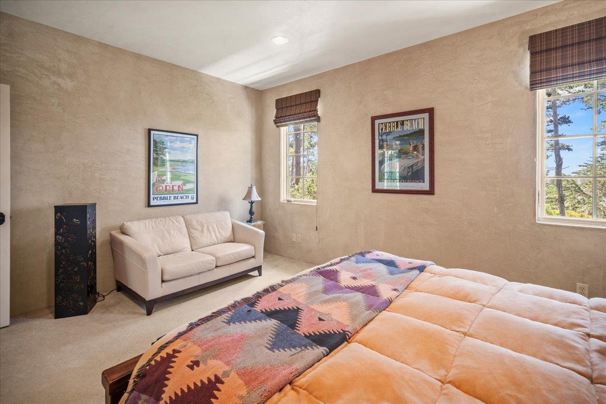 2970 Congress Road Pebble Beach, CA 93953 - Photo 29 of 37 a bedroom with two beds and a couch