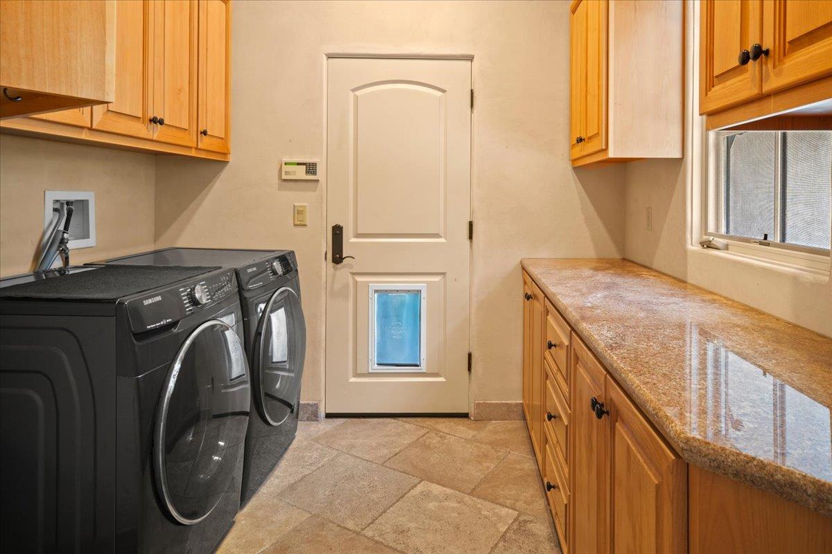 2970 Congress Road Pebble Beach, CA 93953 - Photo 31 of 37 a utility room with dryer and washer