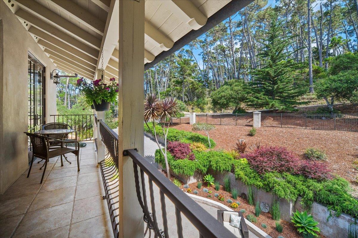 2970 Congress Road Pebble Beach, CA 93953 - Photo 5 of 37 a view of a chair and tables in the balcony