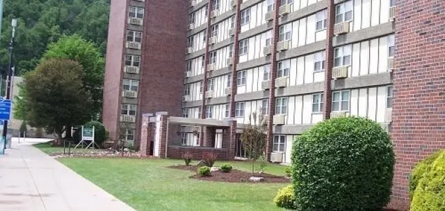 a view of building with yard