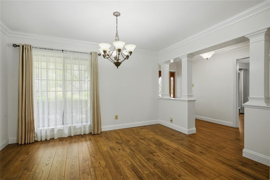 265 East Dove Road Southlake, TX 76092 - Photo 5 of 39 a view of empty room with wooden floor and window