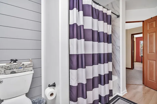a bathroom with a sink and toilet