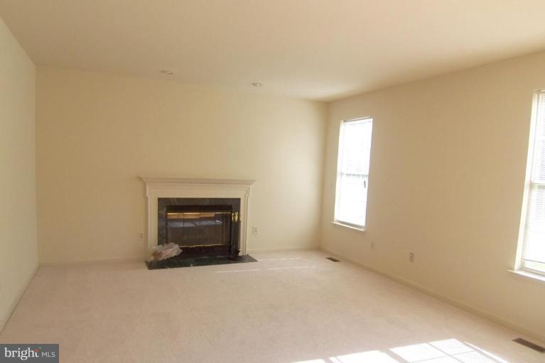 Large Family Room w/ Cozy Woodburning Fireplace