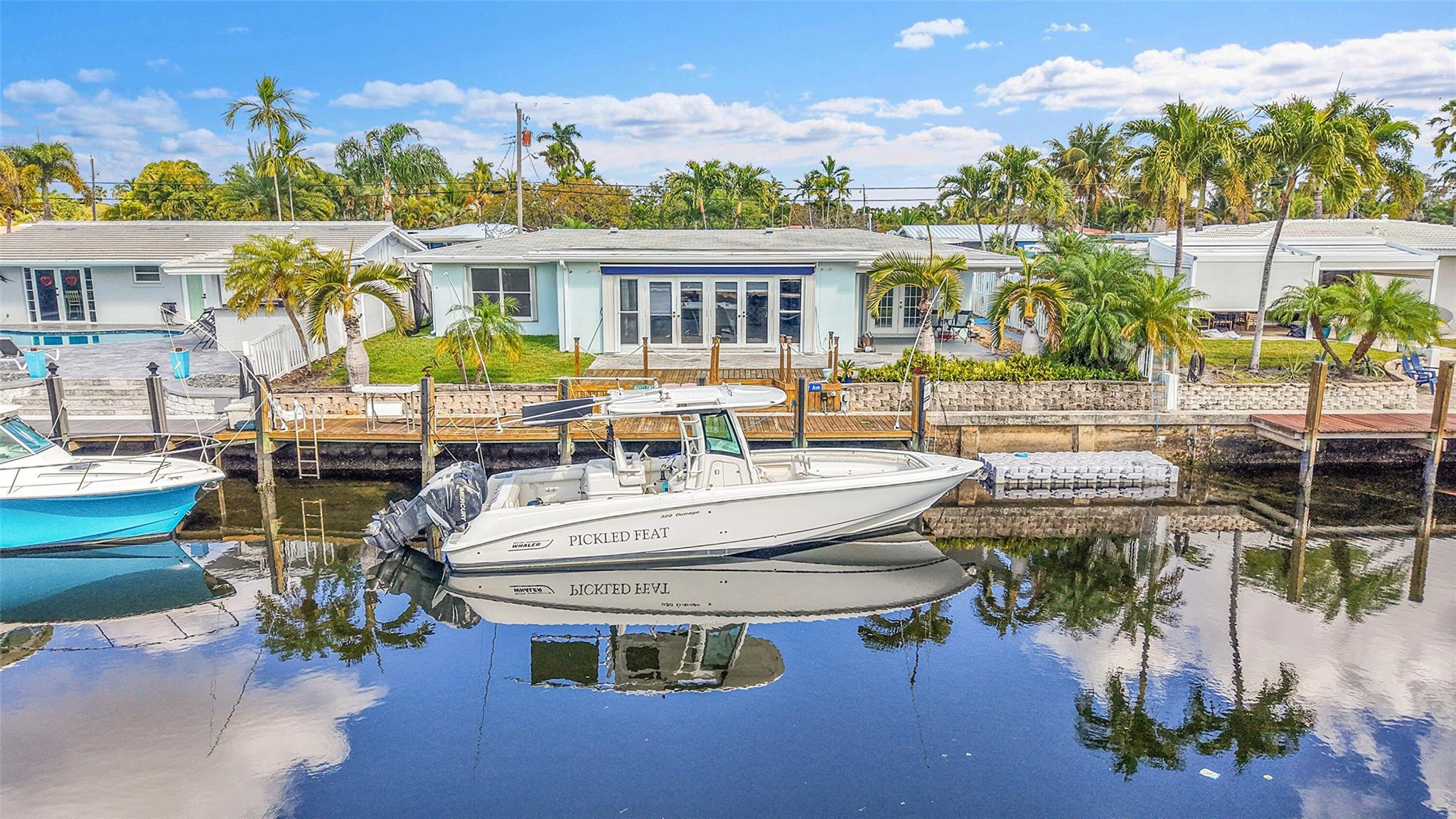 220 Southeast 10th Street Pompano Beach, FL 33060 - Photo 28 of 42 an aerial view of a house with swimming pool garden and patio
