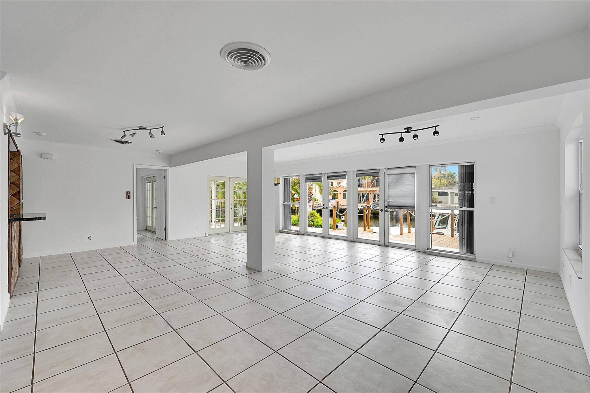 220 Southeast 10th Street Pompano Beach, FL 33060 - Photo 7 of 42 a view of an empty room