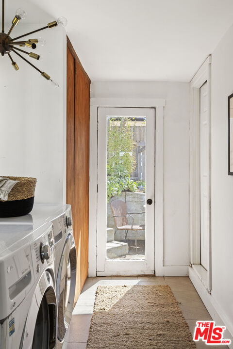 10536 Pinewood Avenue Tujunga, CA 91042 - Photo 24 of 33 a view of a storage & utility room with washer and dryer