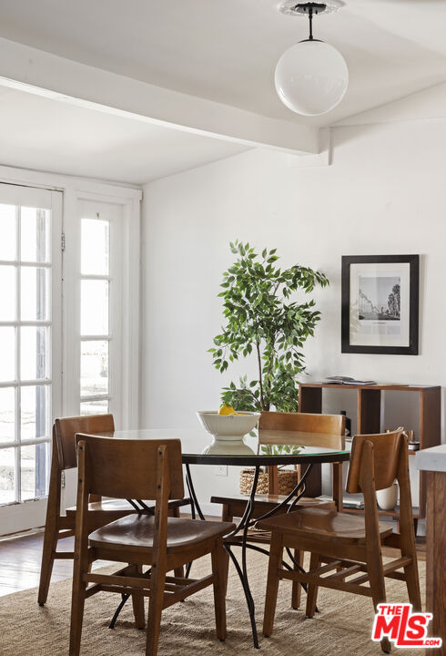 10536 Pinewood Avenue Tujunga, CA 91042 - Photo 10 of 33 a view of a dining room with furniture and window
