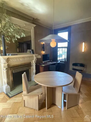 a view of a dining room with furniture
