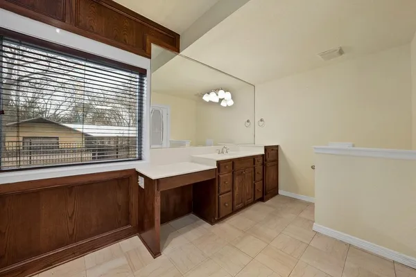 a kitchen with a stove and a sink
