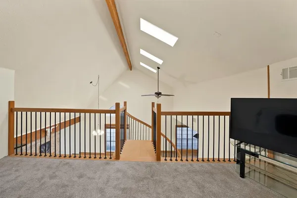 a view of staircase with furniture